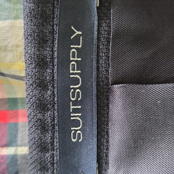 Classic tailored 100% cotton suit.